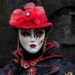 shallow focus photography of person in masquerade mask